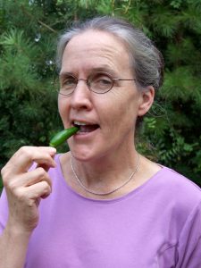 Dr. Alice Ammerman eating a pepper