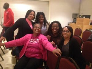 Linda Riggins with group of women at church function