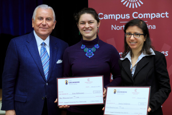 Photo of Jessica Soldavini receiving her award with Board member and faculty winner